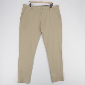 Rhone Commuter Pants Mens 38 Khaki Slim Fit Performance Golf Stretch Flex Knit